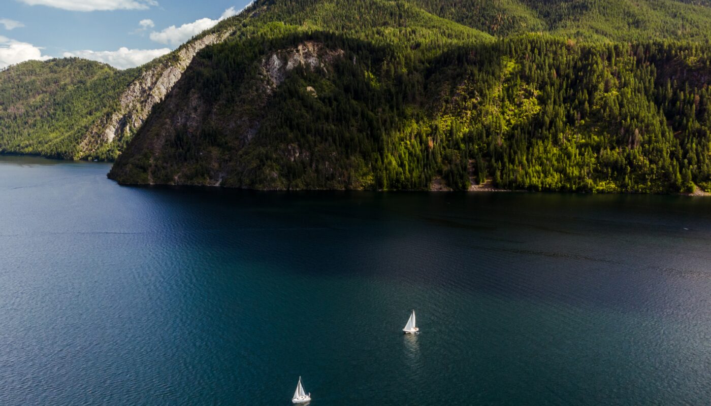 https://www.magnific.com/free-photo/high-angle-shot-boats-sailing-water-with-forested-mountains-distance_14889162.htm#fromView=search&page=1&position=32&uuid=4dfdf4c4-6058-49a6-ac59-d7aa5b95876f&query=The+Future+of+Fjord+Tourism%3A+What%E2%80%99s+Changing%3F