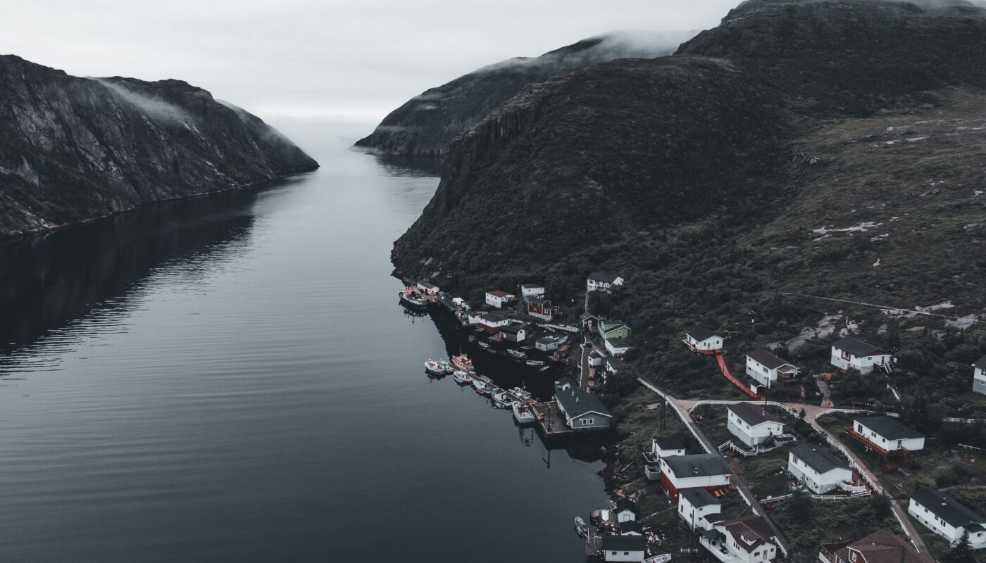 https://www.pexels.com/photo/aerial-view-of-village-on-fjord-shore-17491766/