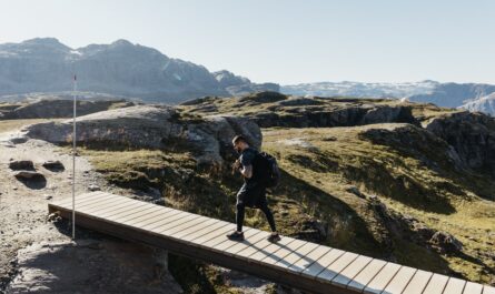 https://www.pexels.com/photo/hiker-crossing-bridge-in-vestland-norway-33564846/