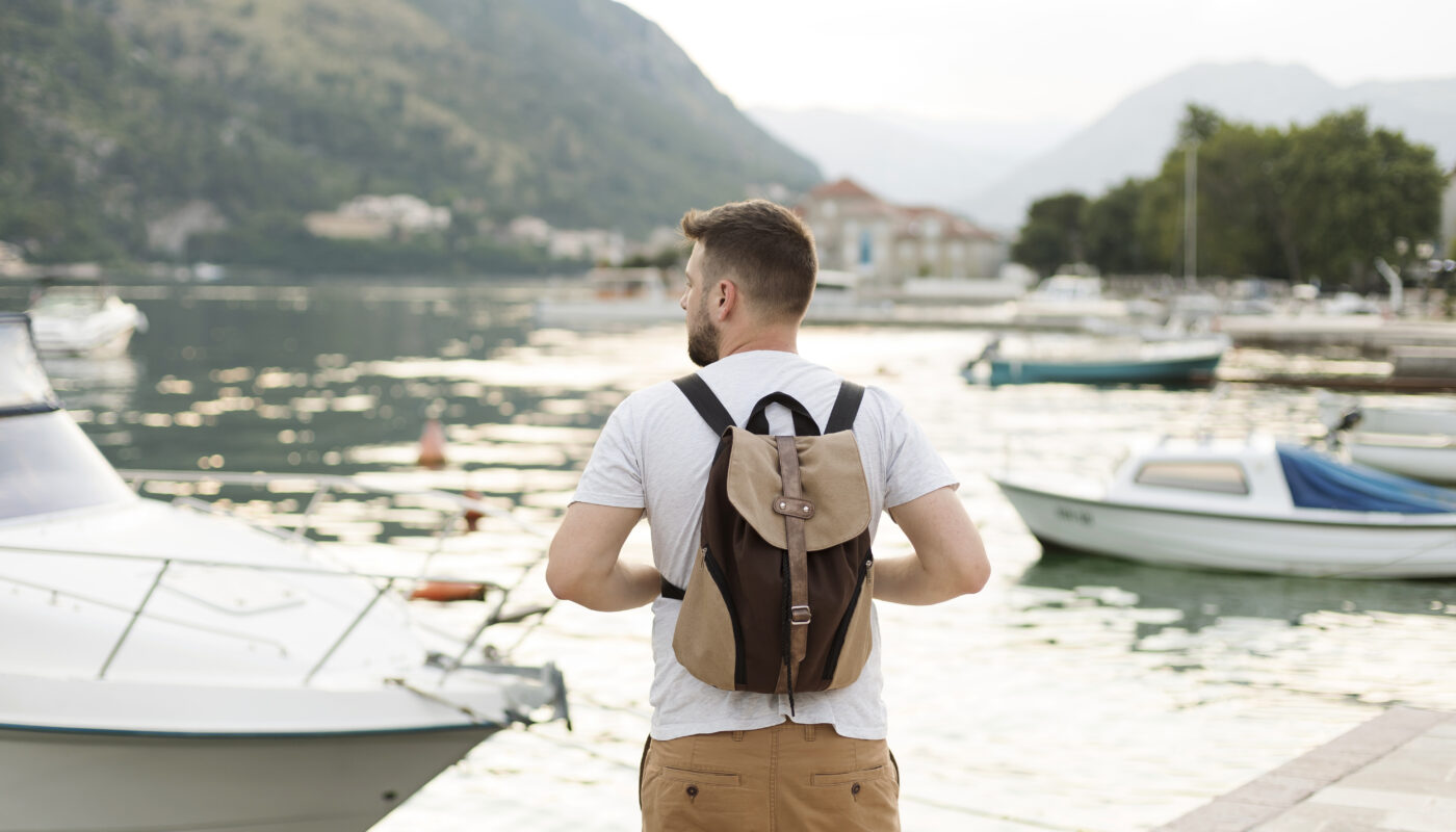 https://www.magnific.com/free-photo/handsome-male-traveler-montenegro_16393018.htm#fromView=search&page=2&position=9&uuid=7f932c3e-6f0a-4035-91e7-ee15e414ee49&track=ais_hybrid&query=How+to+Travel+Fjords+Without+a+Cruise%3A+Independent+Travel+Guide